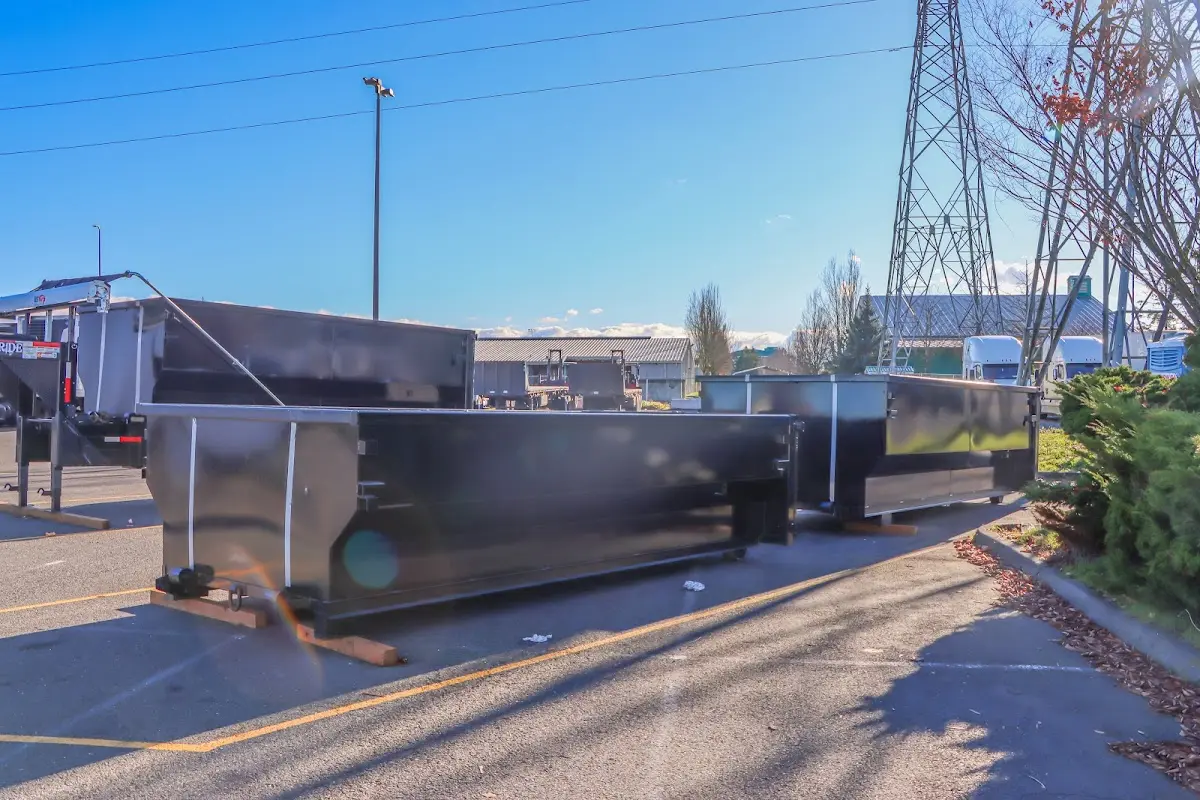 Roll-off dumpster ready for waste disposal at job site for Demolition Dumpster Rental in Schroeppel